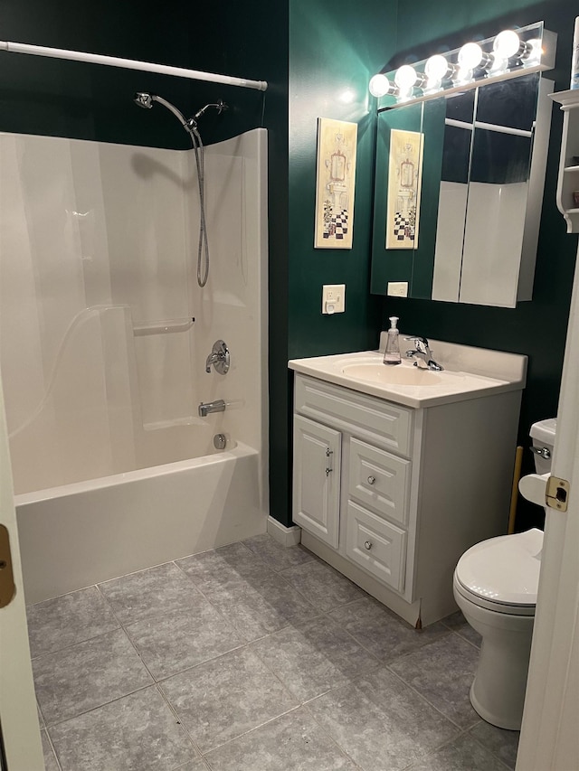 full bathroom with tile patterned floors, vanity, toilet, and shower / tub combination