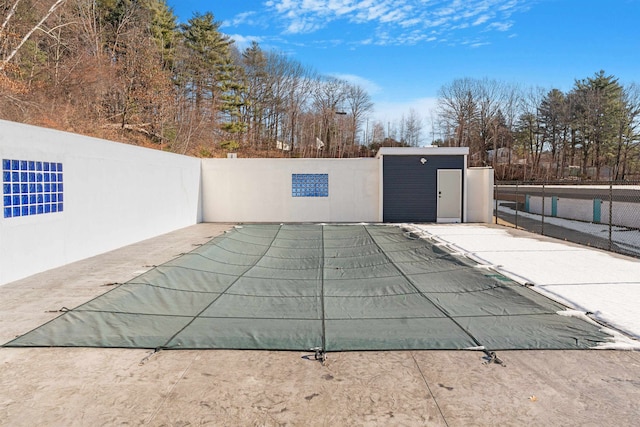 view of swimming pool featuring a patio