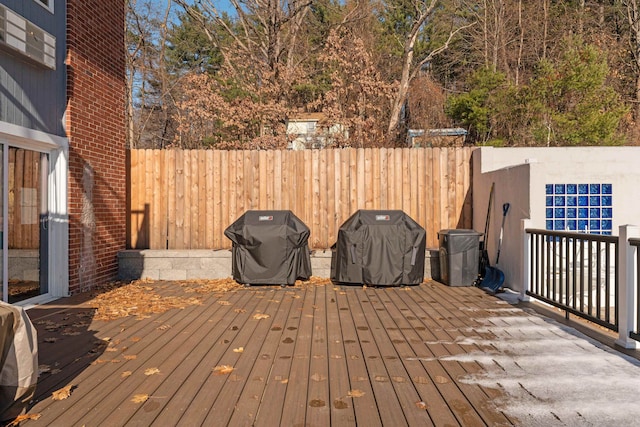 wooden deck with grilling area