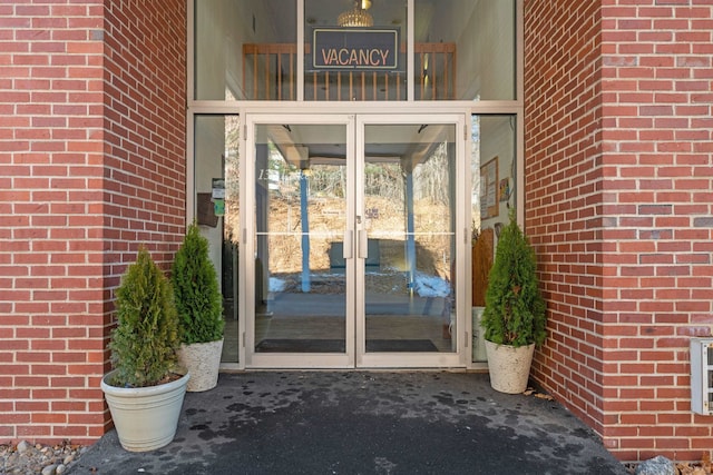 doorway to property featuring french doors