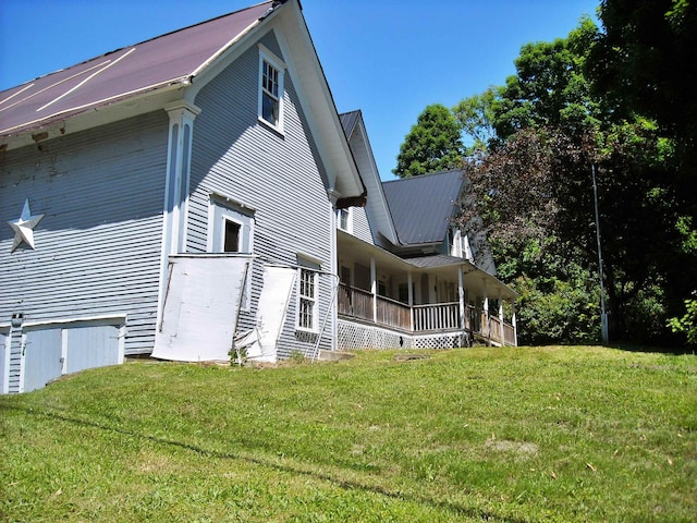 view of property exterior featuring a lawn