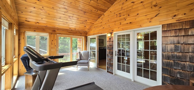 workout area with carpet flooring, wooden walls, high vaulted ceiling, and wooden ceiling