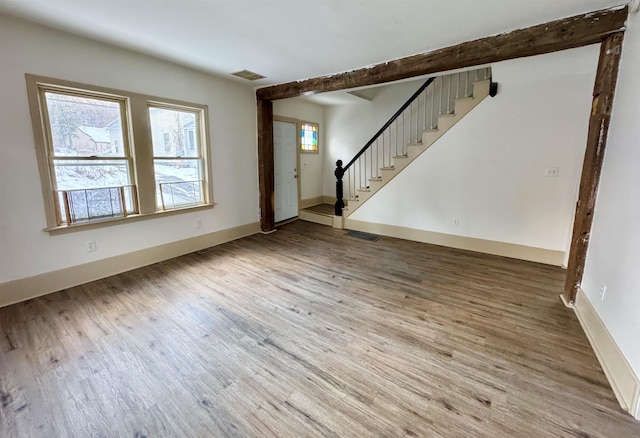 interior space with hardwood / wood-style floors