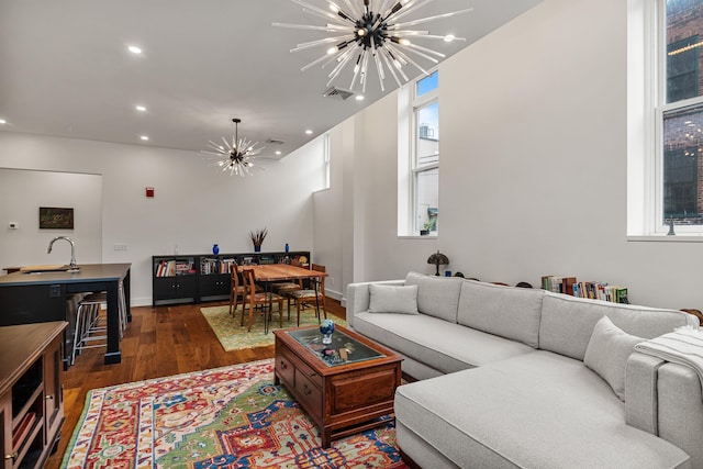 131 Main St Unit 2A-1, Burlington, VT 05401 - living area with a chandelier, healthy amount of natural light, dark wood finished floors, and recessed lighting
