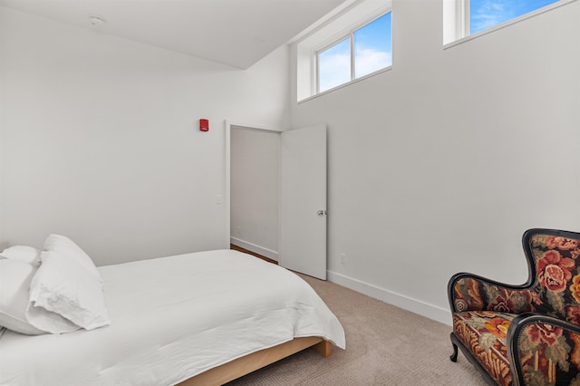 131 Main St Unit 2A-1, Burlington, VT 05401 - bedroom with light colored carpet and baseboards