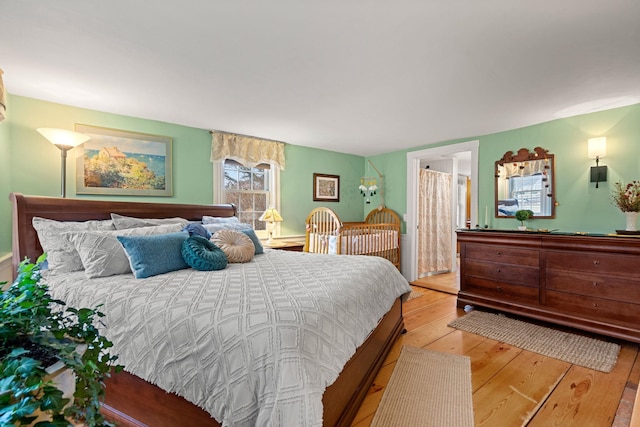 bedroom featuring light hardwood / wood-style floors