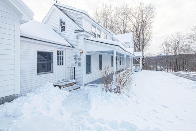 view of snow covered property