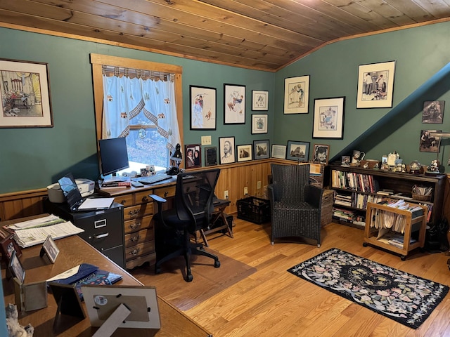 office space featuring wooden ceiling, crown molding, wood-type flooring, lofted ceiling, and wooden walls