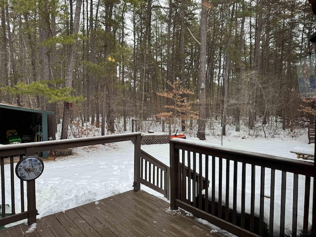 view of snow covered deck