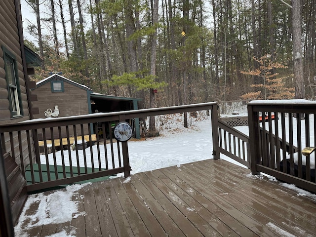 view of snow covered deck