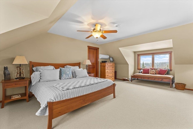 carpeted bedroom featuring ceiling fan and lofted ceiling