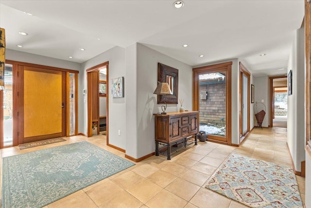 entrance foyer with light tile patterned floors