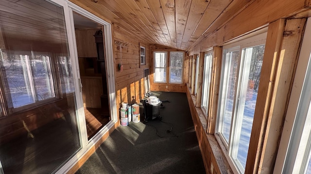 interior space featuring wooden ceiling and vaulted ceiling