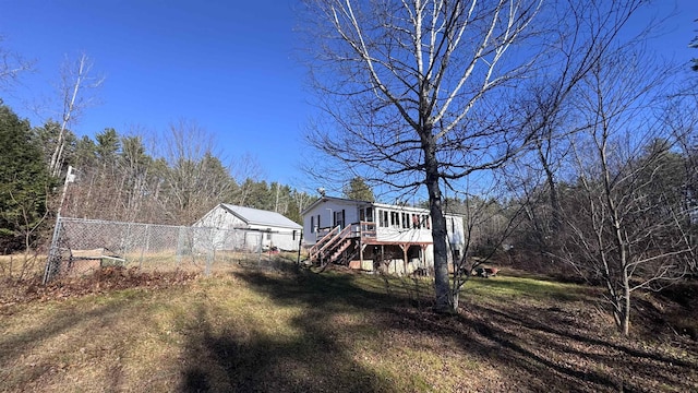 view of yard with a wooden deck