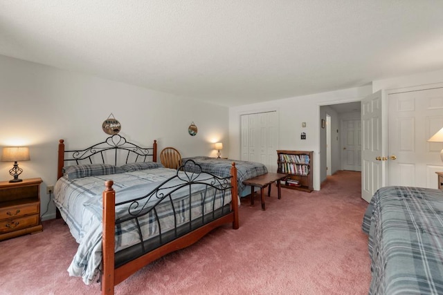 carpeted bedroom featuring a closet