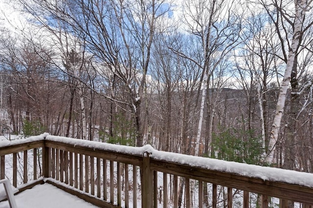 view of snow covered deck