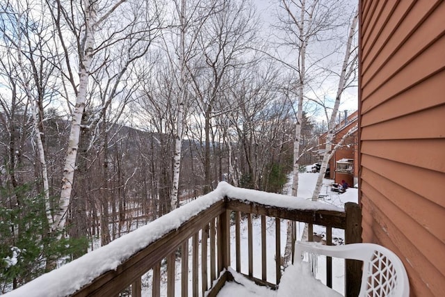 view of snow covered deck