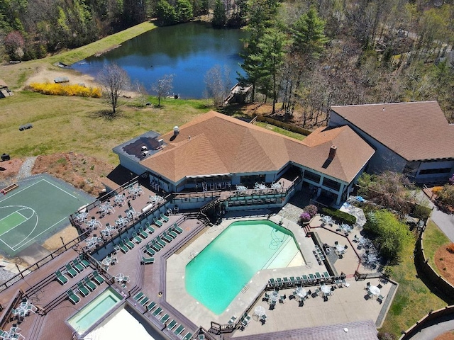 birds eye view of property featuring a water view