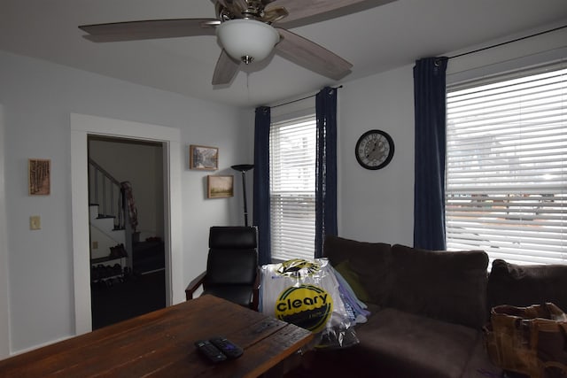 living room featuring ceiling fan