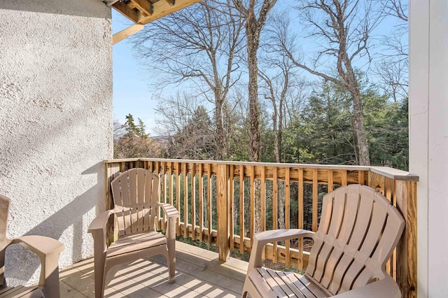 wooden balcony featuring a wooden deck