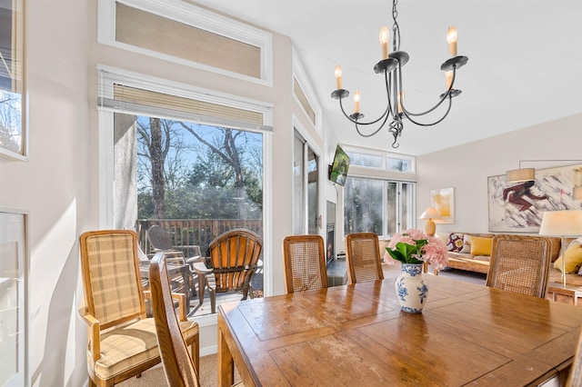 dining room featuring a wealth of natural light and a chandelier