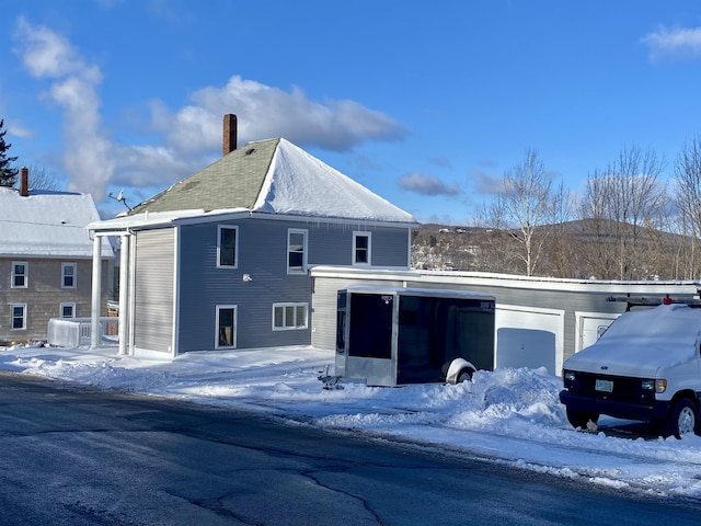 view of snow covered property