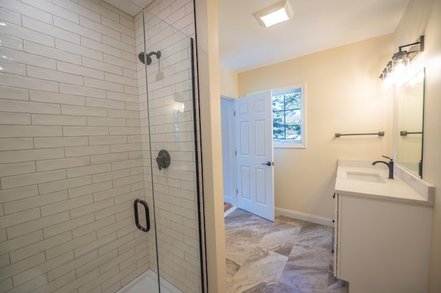 bathroom with vanity and an enclosed shower