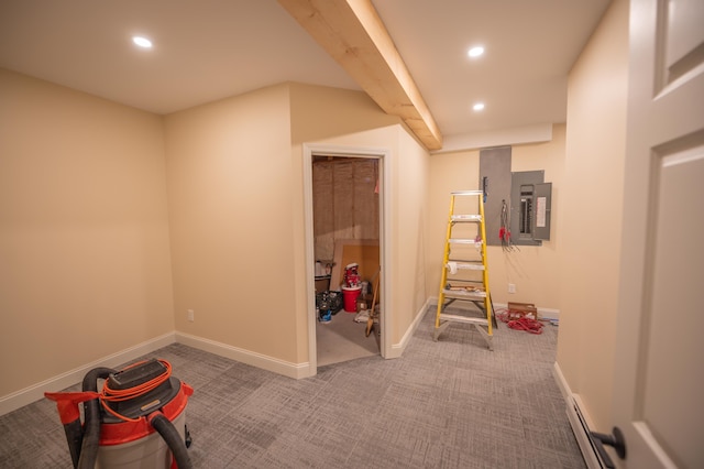 game room with carpet floors, electric panel, and a baseboard heating unit