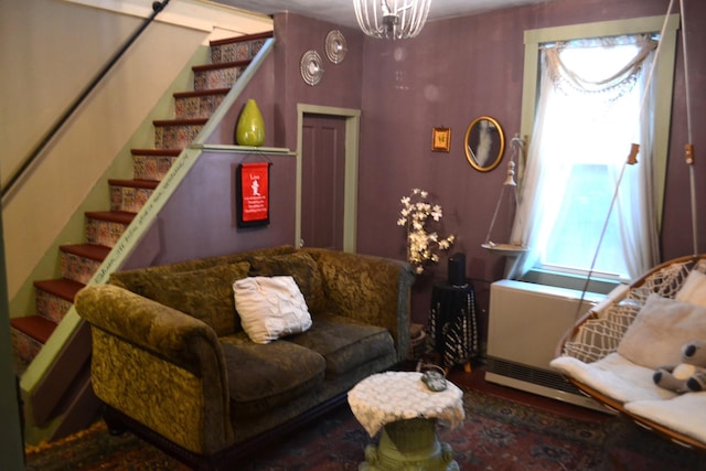 living room with a notable chandelier