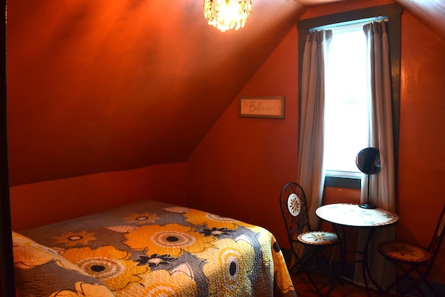 bedroom featuring vaulted ceiling