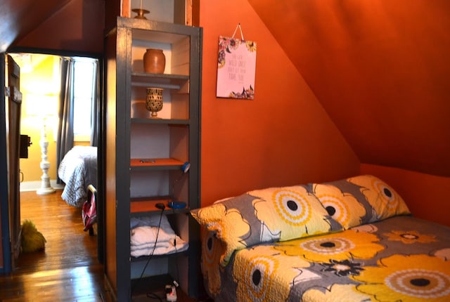 bedroom with wood-type flooring