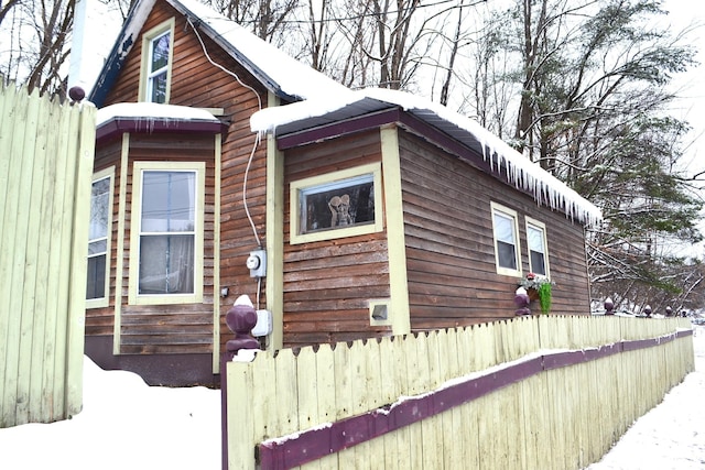 view of snow covered property