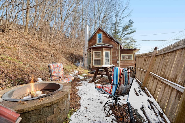 view of patio / terrace with a fire pit