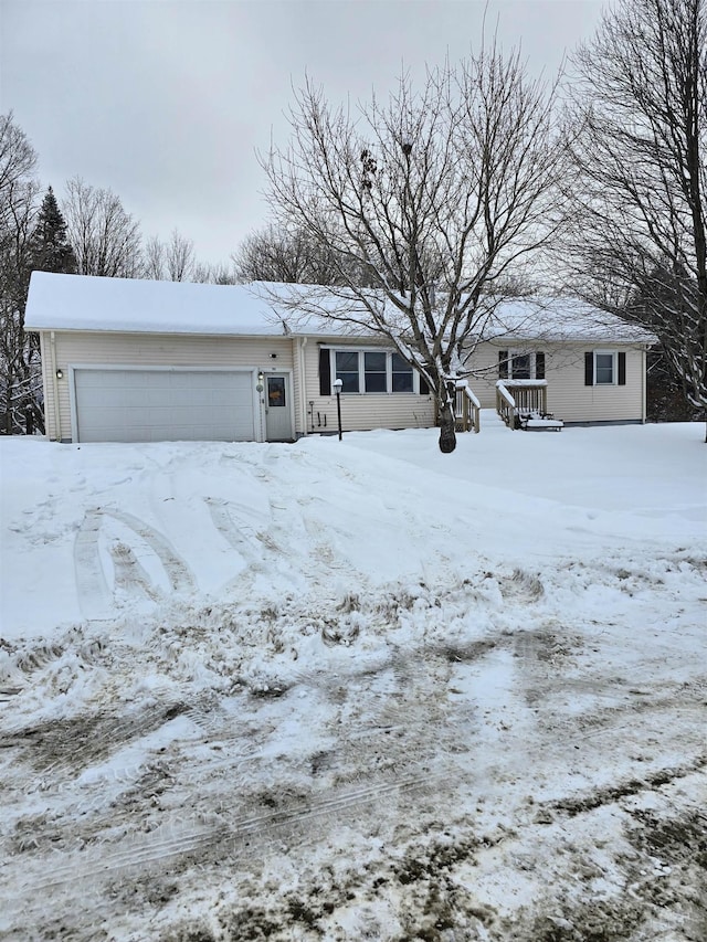 single story home featuring a garage