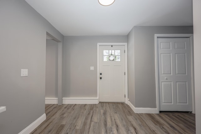 entrance foyer with light hardwood / wood-style floors