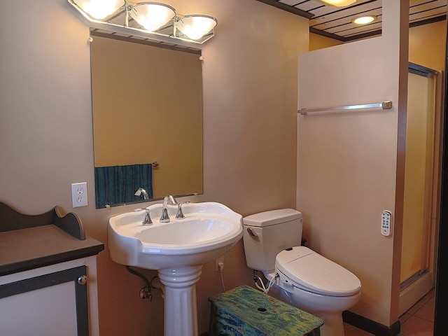 bathroom with tile patterned floors and toilet