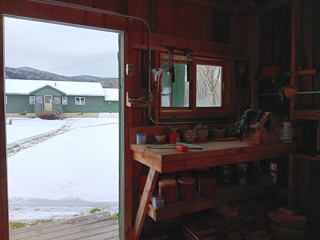 dining room featuring a workshop area and a mountain view