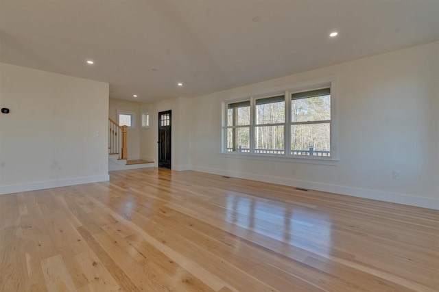 17 Durant Rd, Berwick, ME 03901 - spare room featuring stairway, light wood finished floors, and recessed lighting