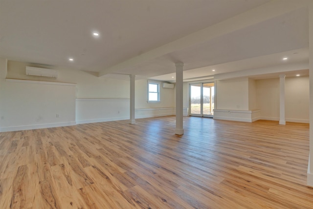 17 Durant Rd, Berwick, ME 03901 - below grade area featuring light wood-style flooring, a wall unit AC, recessed lighting, and a wall mounted AC