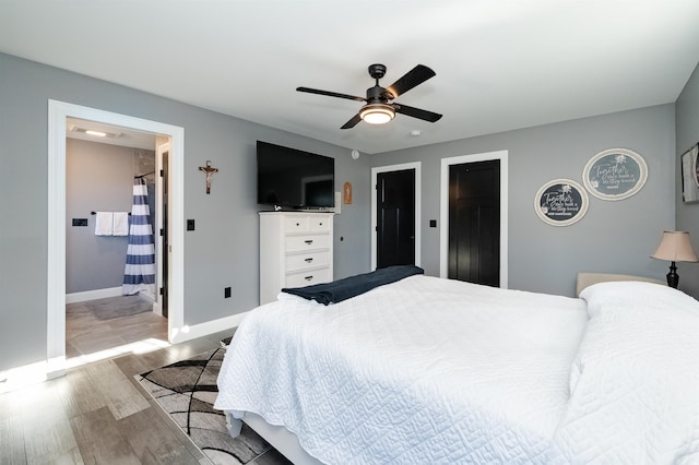 19 Whippoorwill Way, Somersworth, NH 03878 - bedroom featuring wood finished floors, a ceiling fan, and connected bathroom