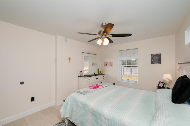 19 Whippoorwill Way, Somersworth, NH 03878 - bedroom with light wood-style flooring and a ceiling fan