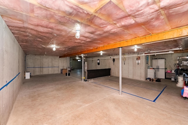 19 Whippoorwill Way, Somersworth, NH 03878 - below grade area with freestanding refrigerator