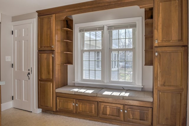 mudroom with light tile patterned floors