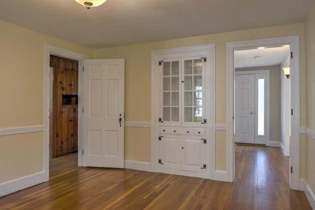 foyer entrance featuring hardwood / wood-style flooring