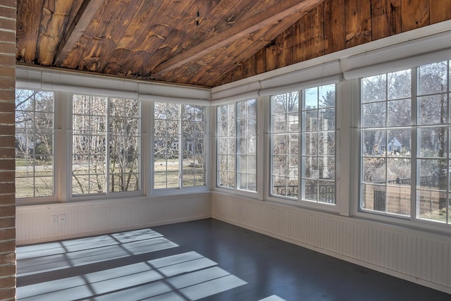 unfurnished sunroom with wood ceiling and lofted ceiling