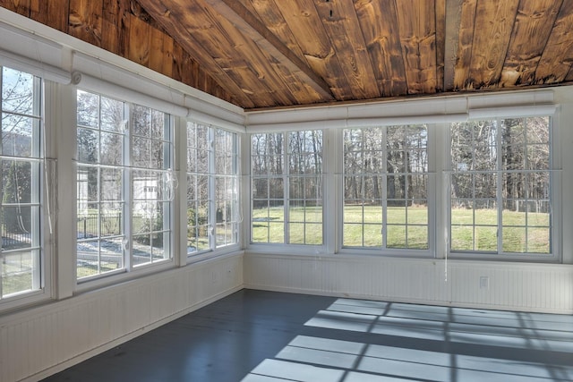 unfurnished sunroom featuring wooden ceiling and vaulted ceiling