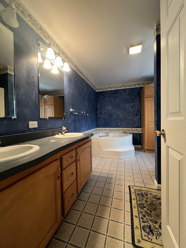 bathroom with a tub to relax in and vanity