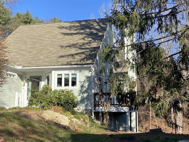 view of home's exterior with a deck