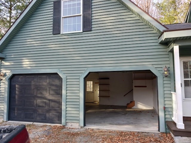 view of property exterior featuring a garage