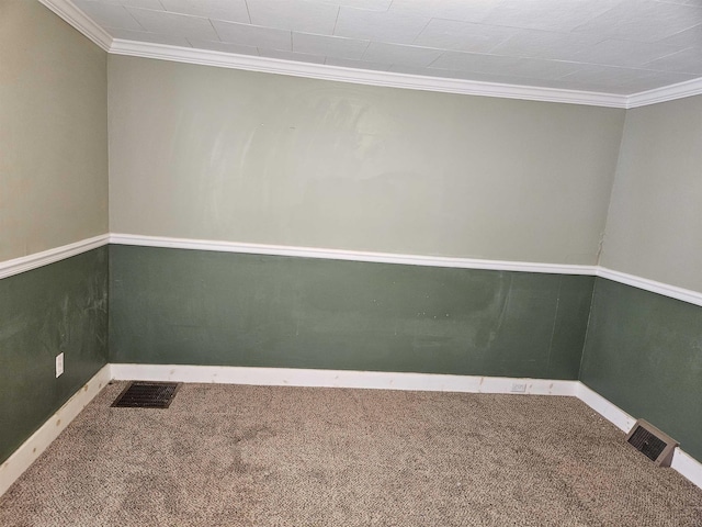 carpeted empty room with crown molding